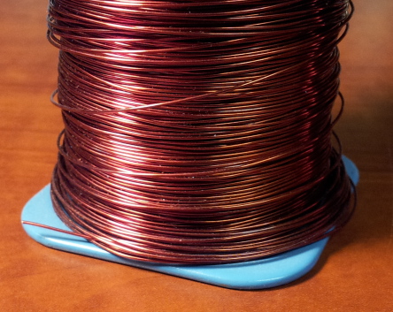 Spool of #24 enameled copper wire.