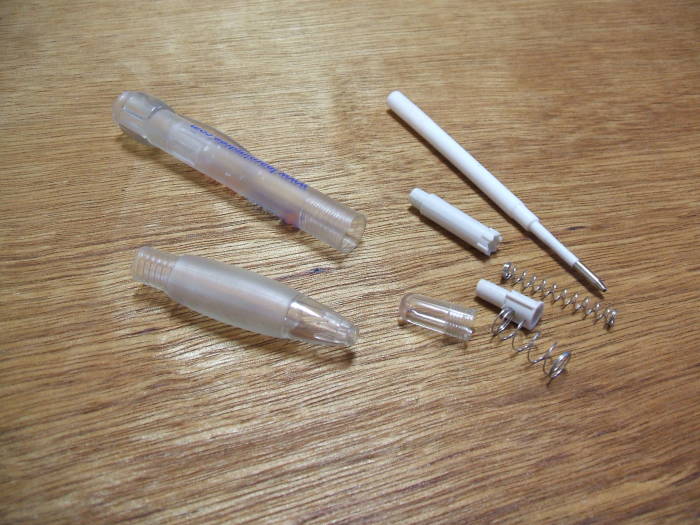 How to build your own oscilloscope probes: Disassembling a ballpoint pen to form the probe.
