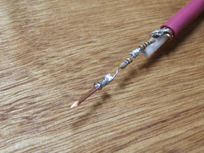 How to build your own oscilloscope probes: Using a nail for a probe tip.