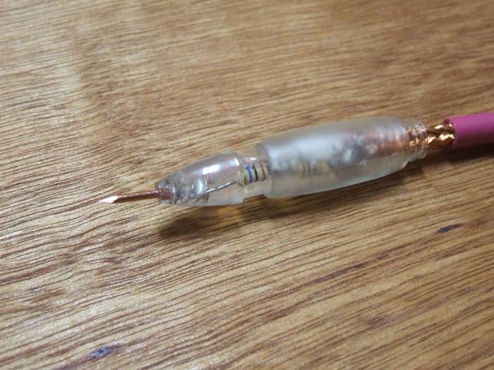 How to build your own oscilloscope probes: Using epoxy to seal the probe tip.