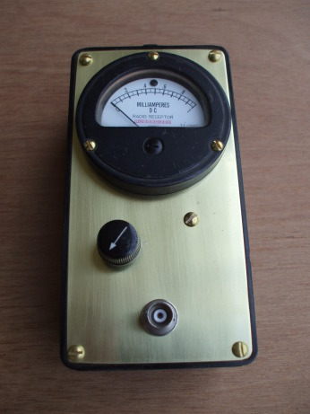 Exterior of RF power meter: meter, sensitivity control, input.