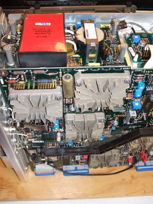Tektronix 2445A repair, interior view, high voltage supply at left and exposed