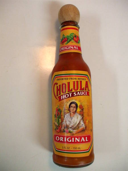 A bottle of Cholula hot sauce.