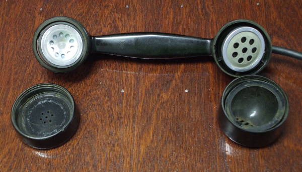 Soviet Багта-50 telephone handset, earpiece and mouthpiece exposed.