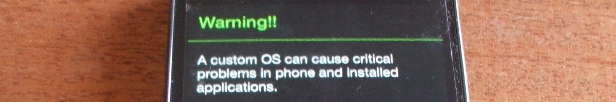 The Samsung Galaxy warns about installing a custom OS.