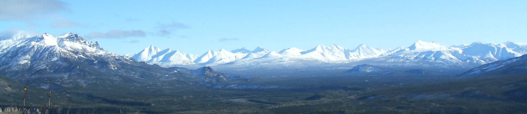 Alaska Range of snow-capped mountains.