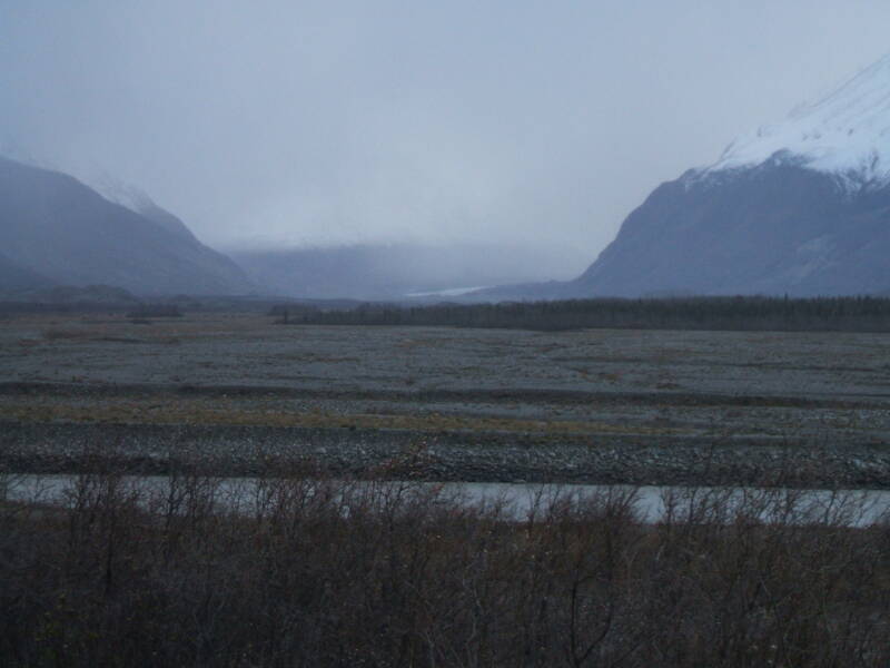 Mountains and a glacial river in the Alaska Range between North Pole and Paxson, Alaska.
