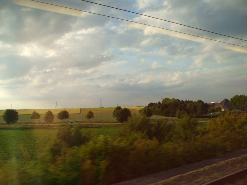 View from a Belgian Thalys high-speed train crossing northeastern France, traveling through Brussels to Paris.