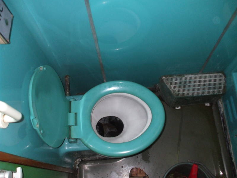 Toilet inside a Bulgarian sleeper or pullman passenger car.
