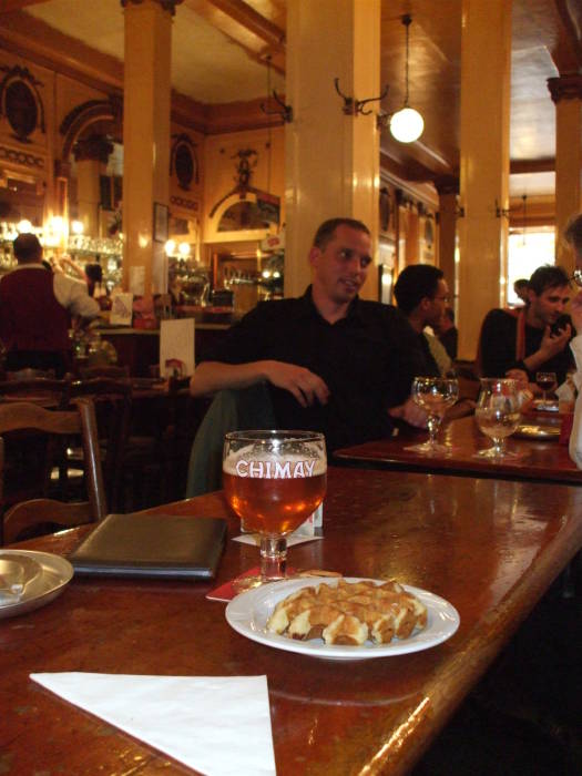 A waffle and a glass of Chimay beer at À la Mort Subite cafe in Brussels.