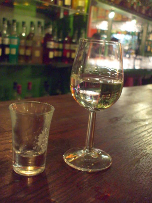 A glass of pisco in the Delirium Tremens absinthe bar in Brussels.