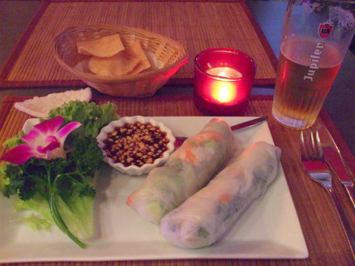 Eating at a sidewalk table at Lotus Thai in Brussels.