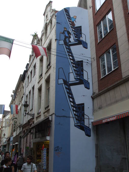 Comic and graphic novel art: Tintin and Captain Haddock climb down a fire escape.