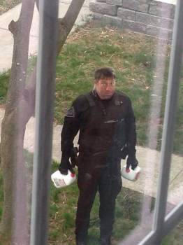 Heavily armed milkman.