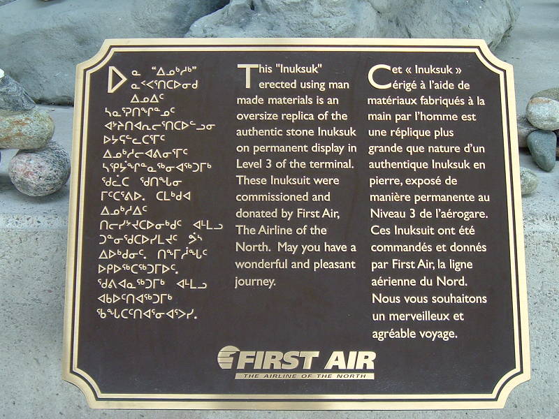 Sign with the inuksuk at Ottawa airport
