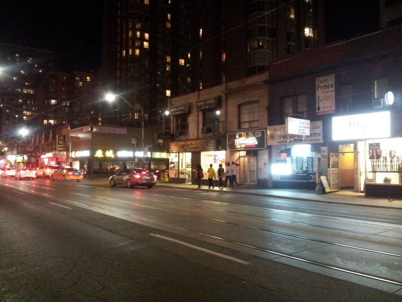 Returning to the hotel along Dundas Street in Toronto in the evening.