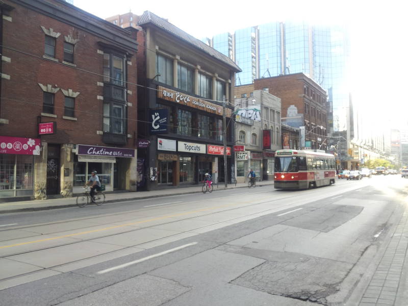 Walking to work along Dundas Street in Toronto in the morning.