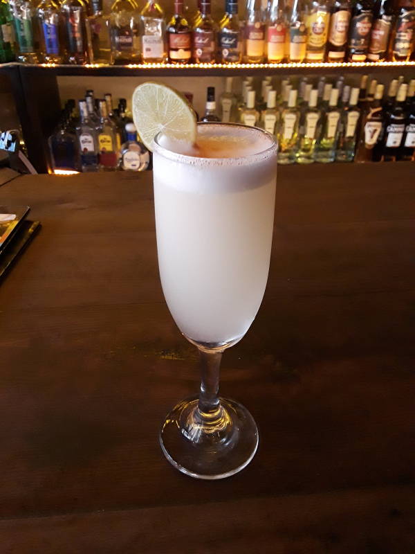 Pisco sour near Plaza Brasil in Santiago