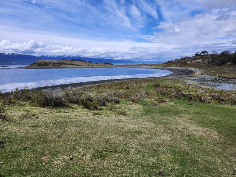 Spit of land, almost-flooded beach.