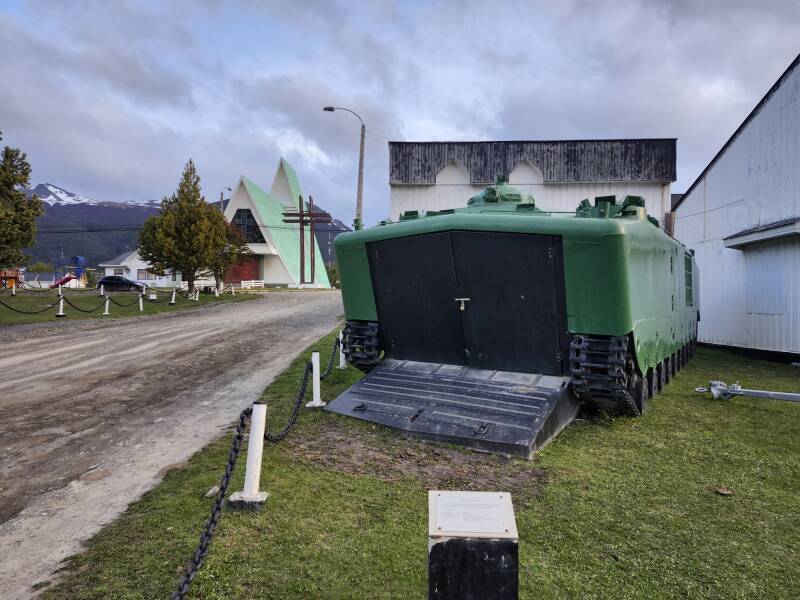 LVTP 5 amphibious vehicle, for landings from a naval transport ship and then all-terrain, all-weather operation. Beyond, the base church.