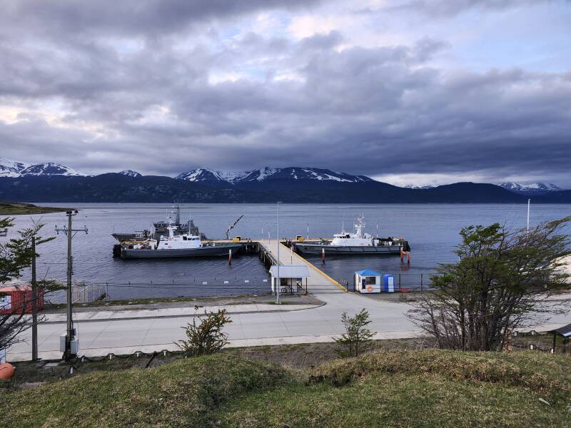 View down over two Coast Guard patrol boat and a Navy patrol boat.