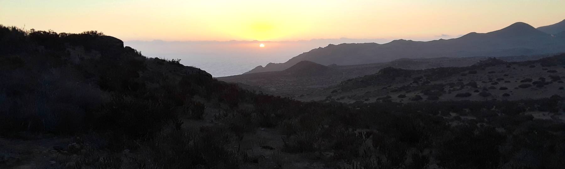 Sunset over the Pacific Ocean from the southern Atacama Desert in Chile.