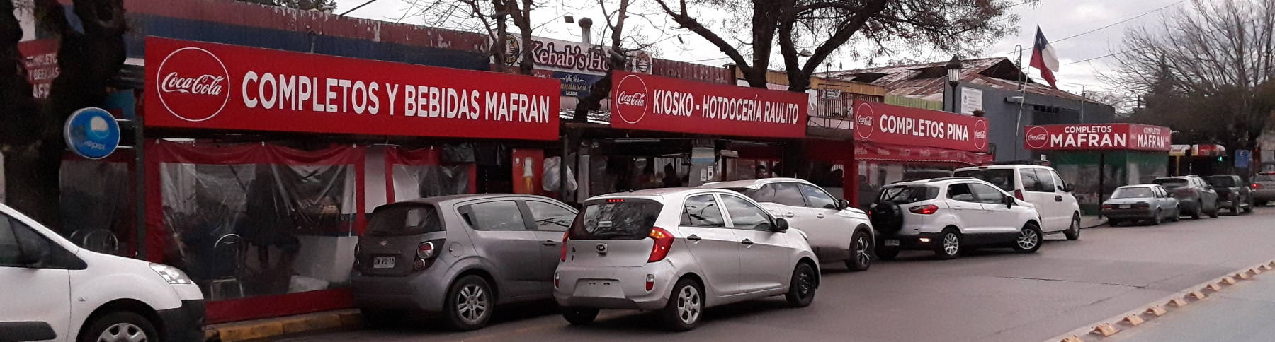 Businesses selling completos in Talca, Chile.