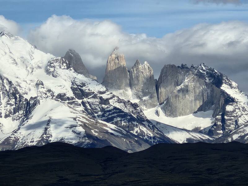  Left to right: northeast slope of Monte Almirante Nieto, Torre del Paine Sur, Torre del Paine Central, Torre del Paine Norte, and Cerro Nido de Condor.  10× zoom