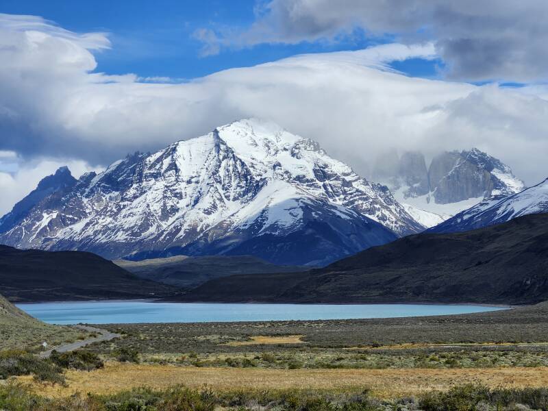 Lenticular clouds over Cuernos del Paine, Monte Almirante Nieto. Clouds obscuring Torre del Paine Sur, Torre del Paine Central, Torre del Paine Norte, and Cerro Nido de Condor.  3× digital zoom.