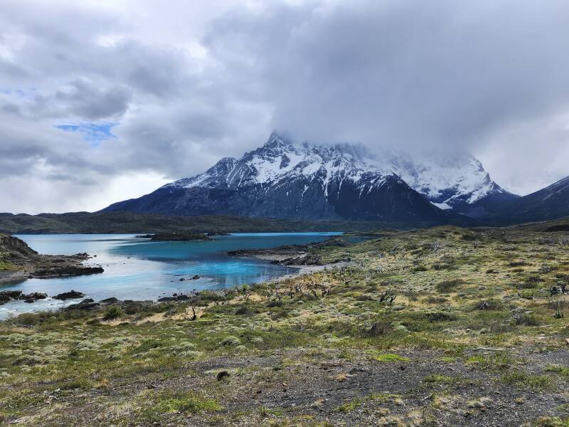 Cerro Paine Grande, its top covered by clouds.