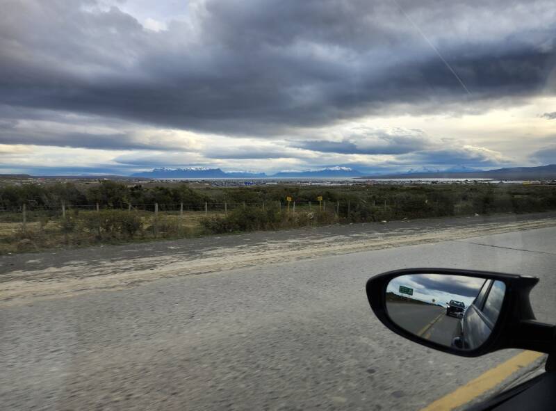 Puerto Natales, its port, and mountains in the distance.