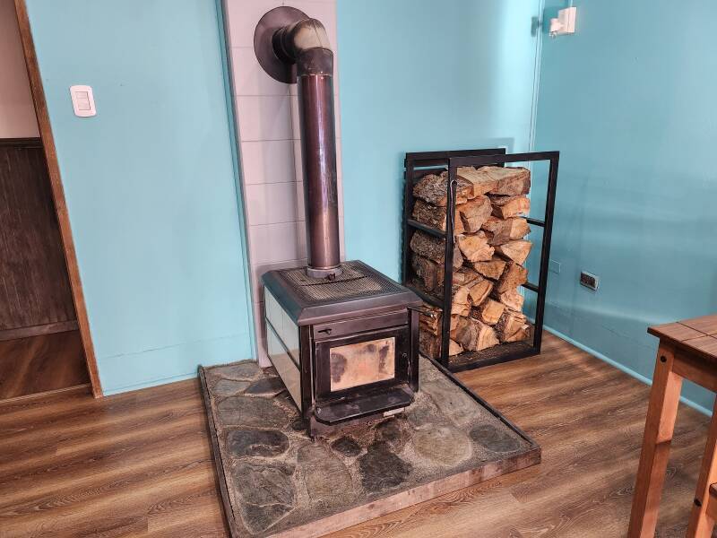 Wood stove with a good supply of fuel.