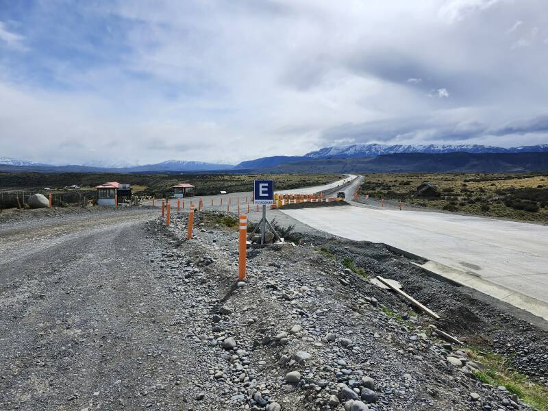 Road entering Torres del Paine, a new broad concrete highway being built.