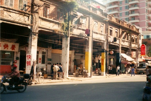 A row of motorcycle repair shops.