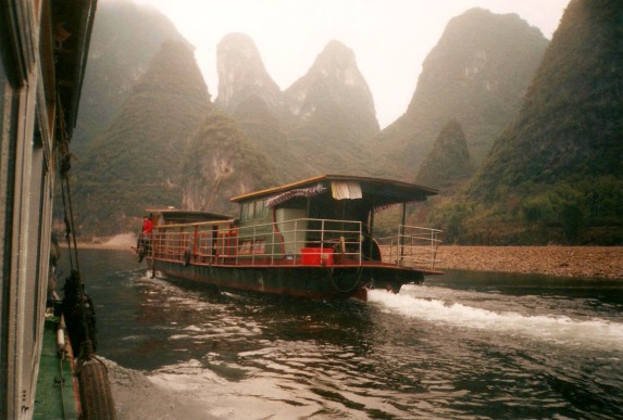 Passing a boat on the Li River.