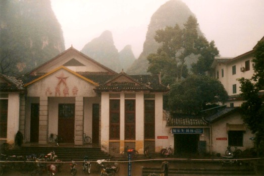 Old buildings and market day in Yangshuo, China.