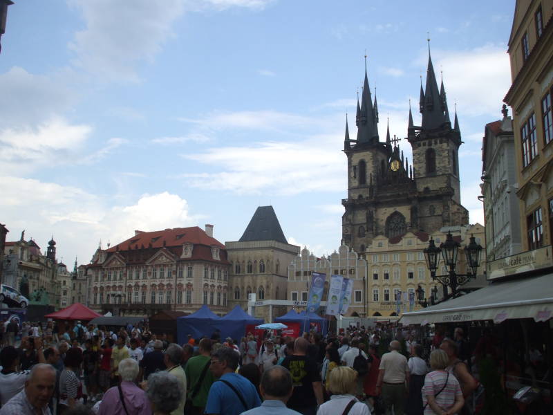 People watching the Astronomical Clock in Old Town Square (Staromĕstské Námĕstí) in Prague.