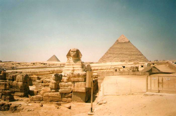Sphinx and the Pyramid of Kheops, Pyramid of Chephren, and Pyramind of Mycerinus, on the Giza Plateau.