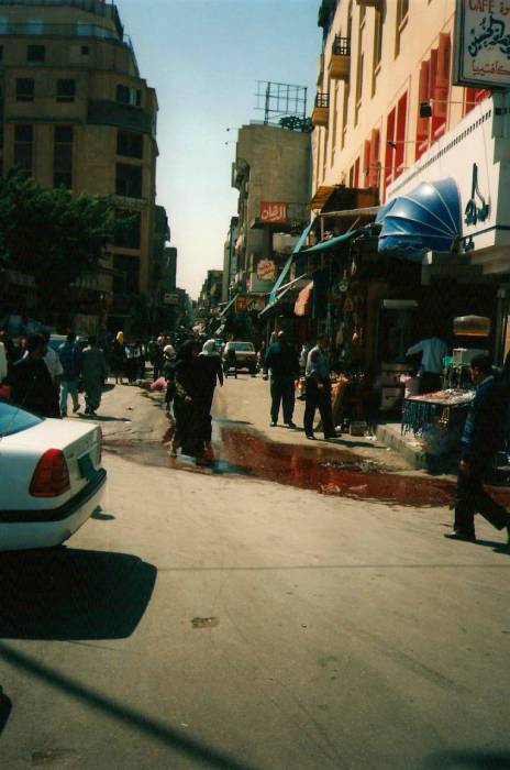 Cairo street scene near Midan Hussein in the Khan al-Khalili bazaar area.