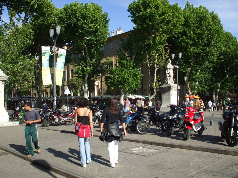 Young people at cafes around La Rotonde at the end of Cours Mirabeau in Aix-en-Provence.