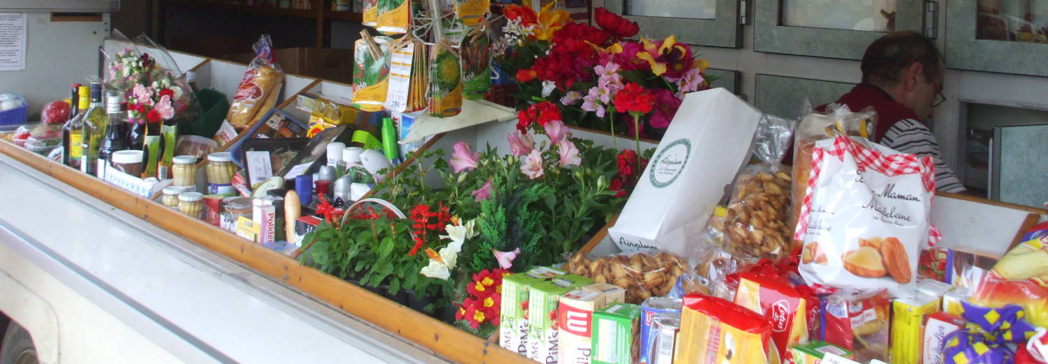 Grocery truck stops in Avril-sur-Loire, France.