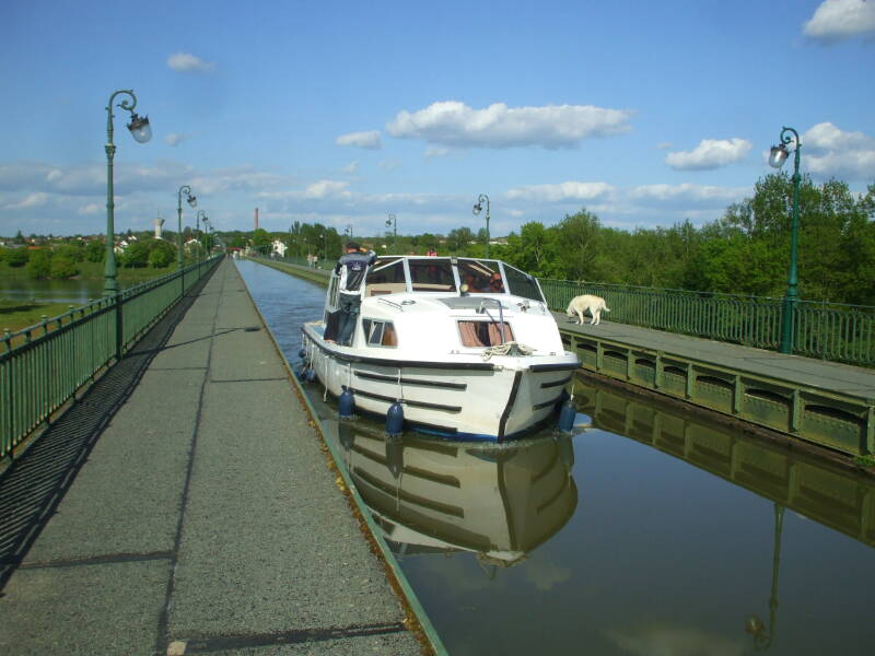 Rented boat crossing Canal Bridge over the Loire River at Briare.