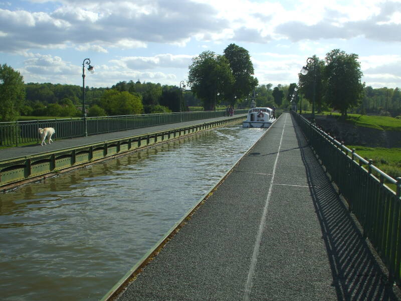 Rented boat crossing Canal Bridge over the Loire River at Briare.