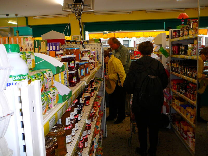 Buying bread and cheese and wine in the grocery store at Châtillon-sur-Loire.