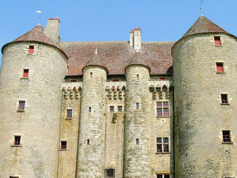 Large round towers of the Château de Chevenon, south of Nevers near the Canal Latéral à la Loire.