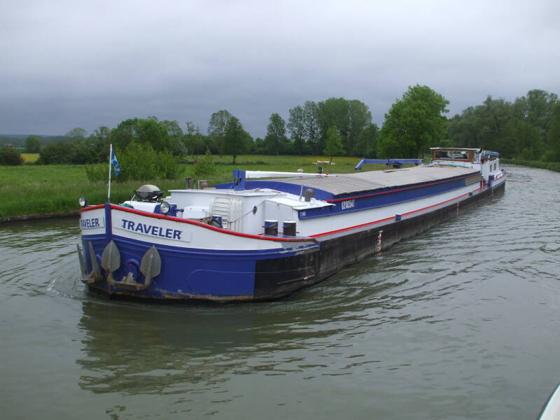 Passing a commercial barge on the Canal Latéral à la Loire.