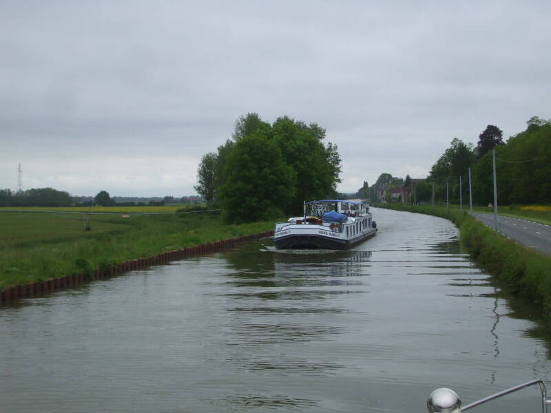 Passing a commercial barge on the Canal Latéral à la Loire.