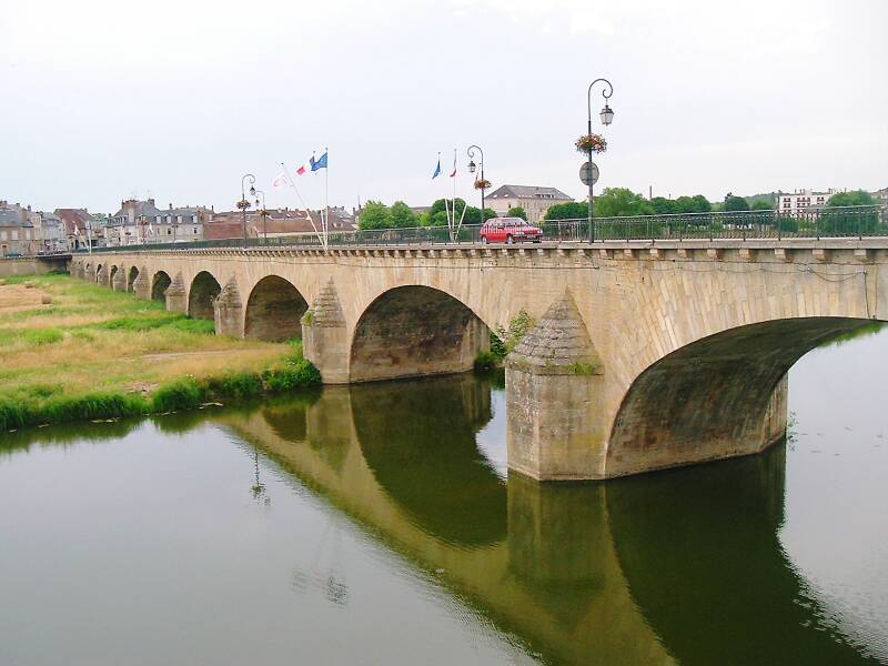 Bridge from the boat basin to the old city in Decize.