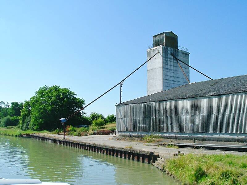 Grain elevator for loading grain onto canal boats in France.