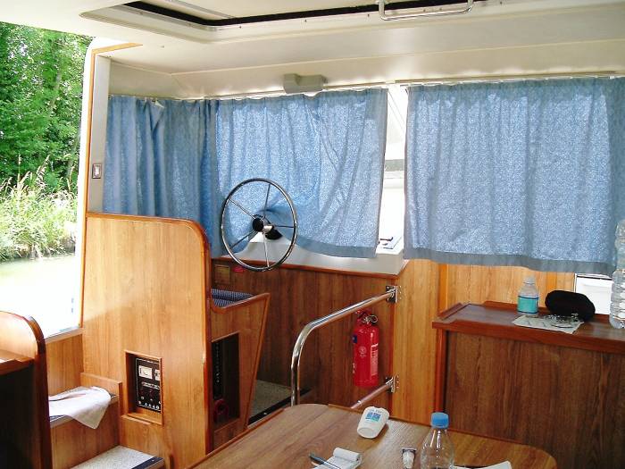 Dining area and auxilliary on board the canal boat.